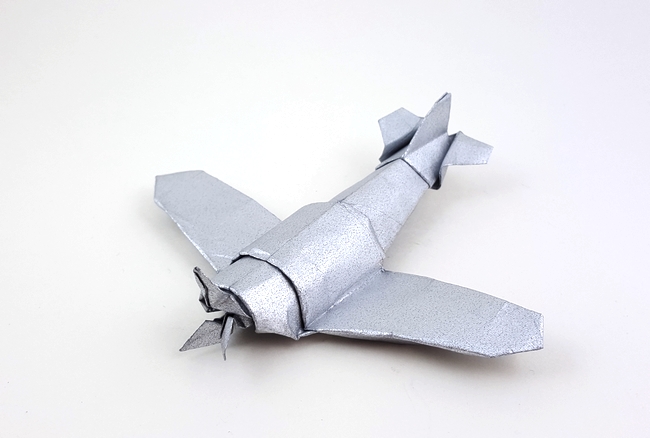 Origami Spitfire by Max Hulme. Folded from a rectangle of Nicolas Terry's tissue-foil by Gilad Aharoni on giladorigami.com
