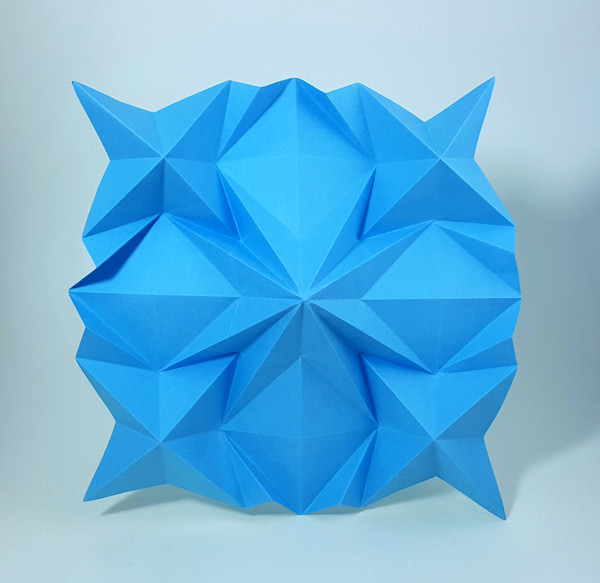 Origami Squares and Crosses Tessellation by Winnie Leung. Folded from a square of Tant paper by Gilad Aharoni on giladorigami.com