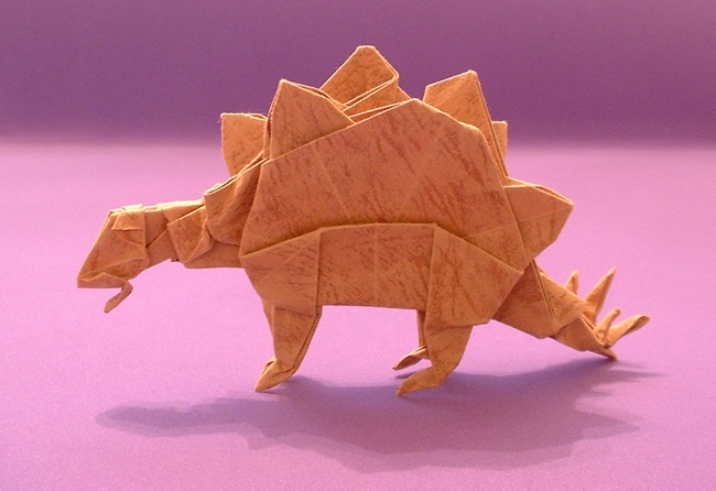 Origami Stegosaurus by John Montroll. Folded from a square of leather-textured paper by Gilad Aharoni on giladorigami.com