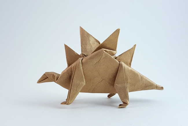 Origami Stegosaurus by Takai Hiroaki. Folded from a square of India Gold scrapbooking paper by Gilad Aharoni on giladorigami.com