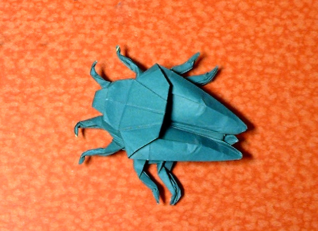 Origami Stink bug by John Montroll. Folded from a square of origami paper by Gilad Aharoni on giladorigami.com