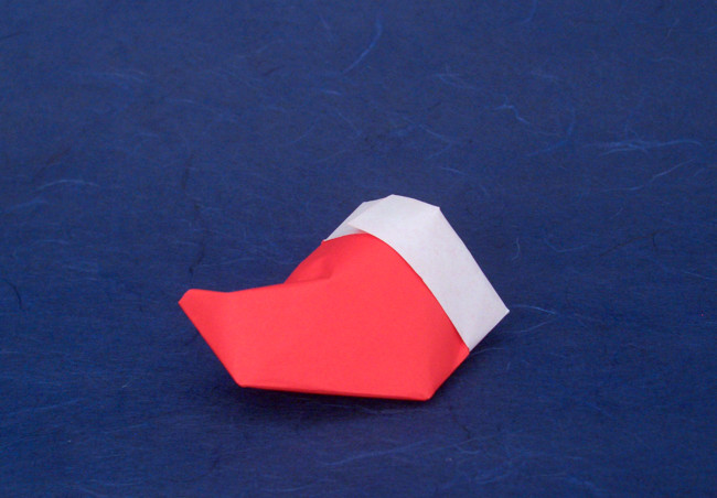 Origami Stocking by John Montroll. Folded from a square of origami paper by Gilad Aharoni on giladorigami.com