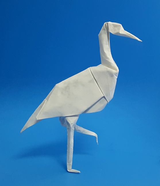 Origami Stork by John Montroll. Wet folded from a square of Royal Marble scrapbooking paper by Gilad Aharoni on giladorigami.com