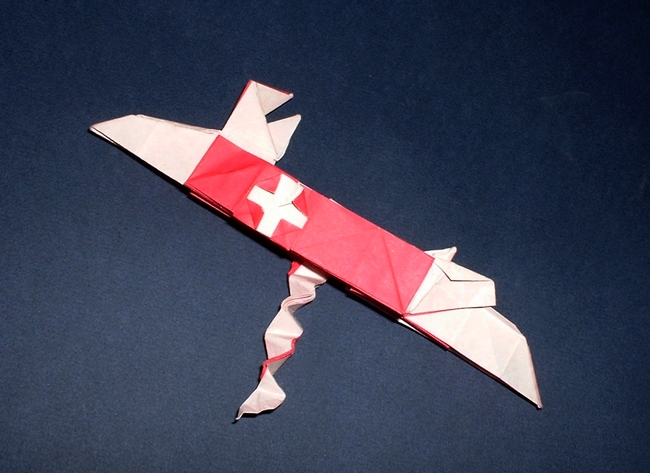 Origami Swiss army knife by Jun Maekawa. Folded from a square of origami paper by Gilad Aharoni on giladorigami.com