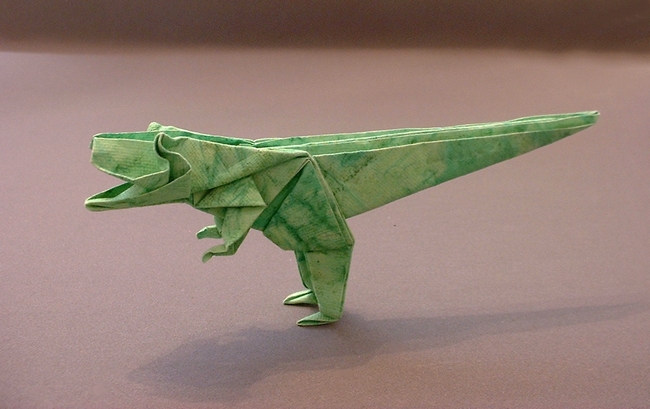 Origami Tyrannosaurus by Jun Maekawa. Folded from a square of patterned art paper by Gilad Aharoni on giladorigami.com