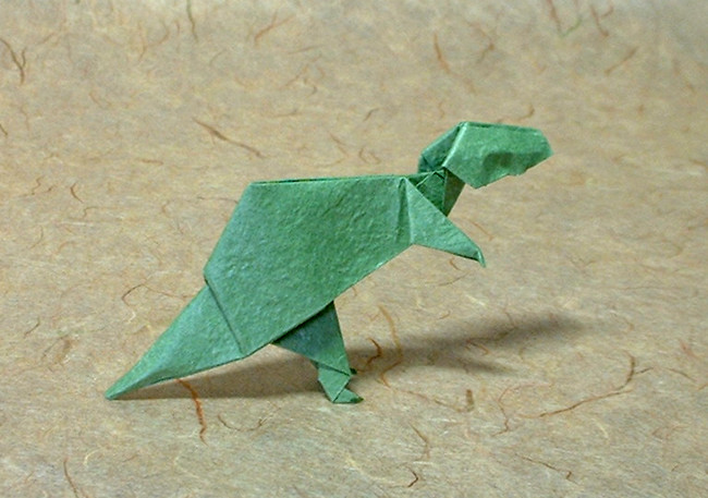 Origami Tyrannosaurus by John Montroll. Folded from a US$ proportioned rectangle of Vietnamese wrapping-paper by Gilad Aharoni on giladorigami.com