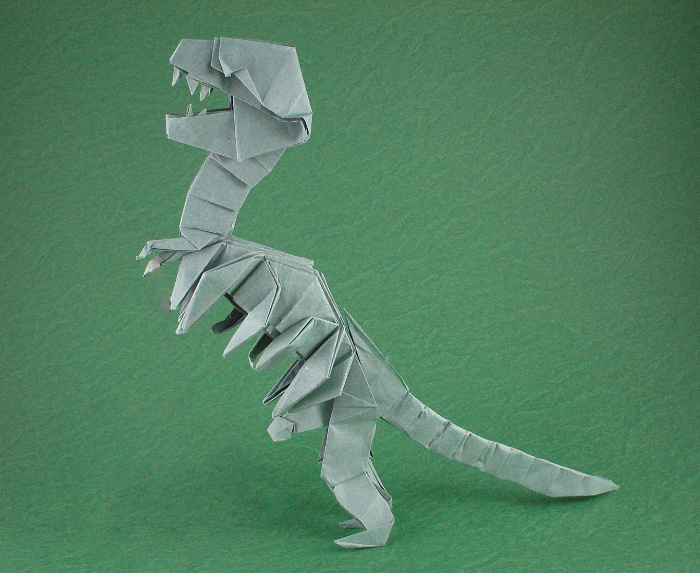 Origami Tyrannosaurus rex skeleton by Peter Budai. Folded from 5 squares of Trimaco masking paper by Gilad Aharoni on giladorigami.com
