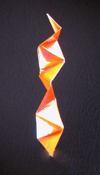 Origami Twister by John Montroll. Folded from a square of holographic paper by Gilad Aharoni on giladorigami.com