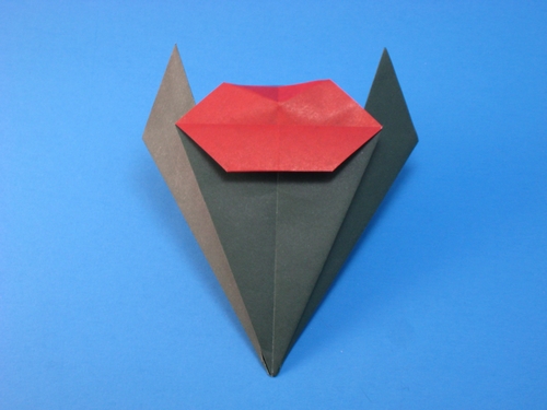 Origami Two lips by Michael G. LaFosse. Folded from a square of duo origami paper by Gilad Aharoni on giladorigami.com