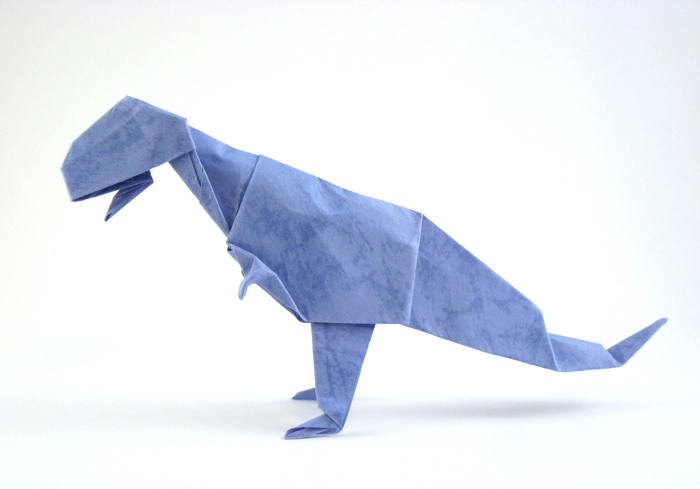 Origami Tyrannosaurus by John Montroll. Folded from a square of textured origami paper by Gilad Aharoni on giladorigami.com