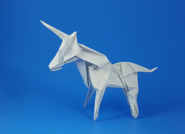 Origami Unicorn by Zhao Yanjie. Folded from a square of Solid Pearl scrapbooking paper by Gilad Aharoni on giladorigami.com