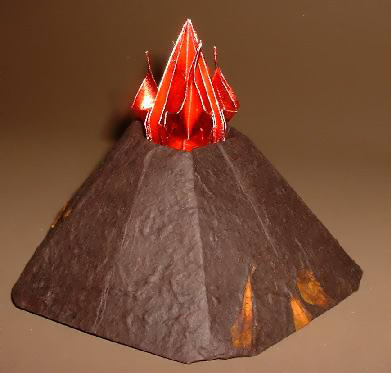 Origami Volcano by Jodi Fukumoto. Volcano folded from a square of art paper. Eruption folded from a square of foil by Gilad Aharoni on giladorigami.com