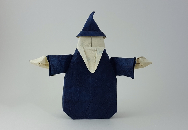 Origami Wizard by John Montroll. Folded from a square of Crinkle Blue scrapbooking paper by Gilad Aharoni on giladorigami.com