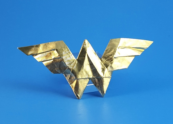 Origami Wonder Woman symbol by John Montroll. Folded from a square of Japanese foil by Gilad Aharoni on giladorigami.com