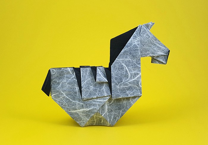 Origami Zebra by Tsuruta Yoshimasa. Folded from a square of Duo Thai paper by Gilad Aharoni on giladorigami.com