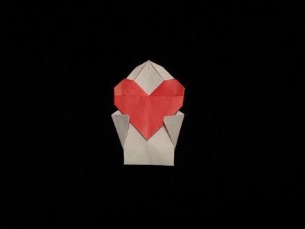 Origami Doll with heart by Sanae Sakai on giladorigami.com